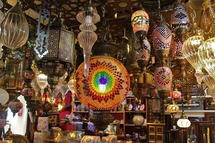 Colorful lanterns create a delightful ambiance in the heart of Sharjah inviting travelers to explore the rich culture and unique craftsmanship of the region's traditional markets.